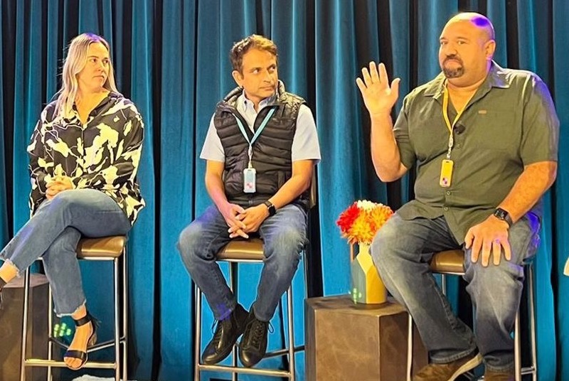 Vikram Pathania seated on a public panel discussion